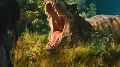 Luna Blaise and a T-Rex at the river in 'Jurassic World Rebirth' coming this summer to Universal Studios Hollywood Mega Movie Summer.