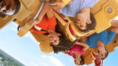 A group of people are riding Hollywood Rip Ride Rockit. They are upside down.