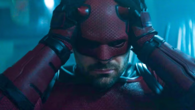 Daredevil putting on a helmet