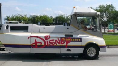 A Disney tram with "Disney Transport" written on the side