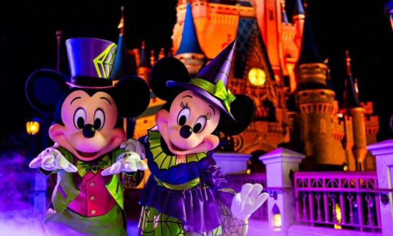 Mickey and Minnie Mouse dressed in Halloween costumes for Mickey's Not-So-Scary Halloween Party
