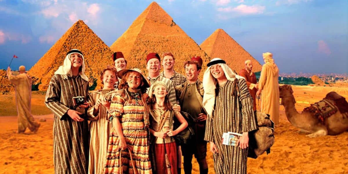 The Weasley Family stands in front of the pyramids of Giza