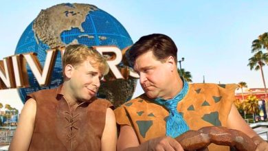 Mixed image: Universal Orlando globe in the background, Fred and Barney from 'The Flintstones' (1994) movie in the foreground
