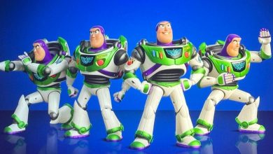Four Buzz Lightyear action figures stand in different dynamic poses against a bright blue background, each displaying confident and heroic expressions.