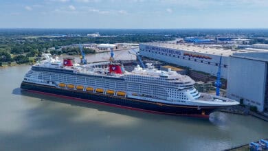 Disney Cruise Line ship sailing on the water.