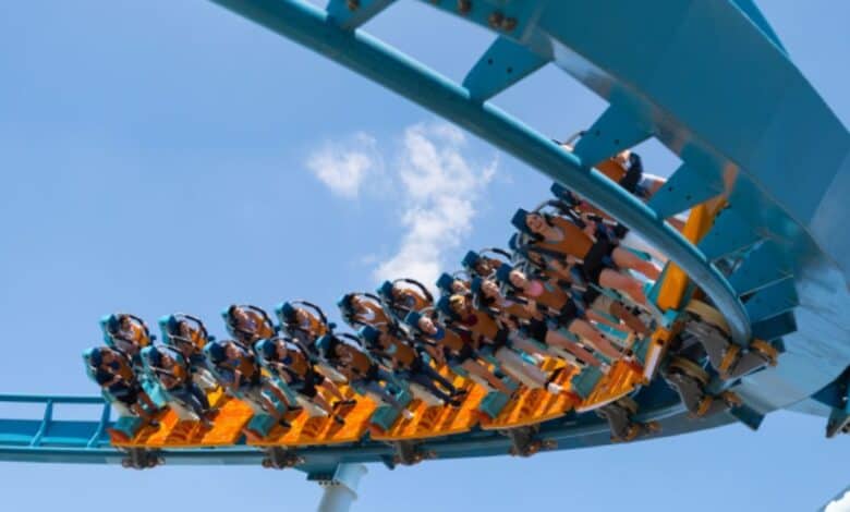 People riding Pipeline: The Surf Coaster at SeaWorld Orlando