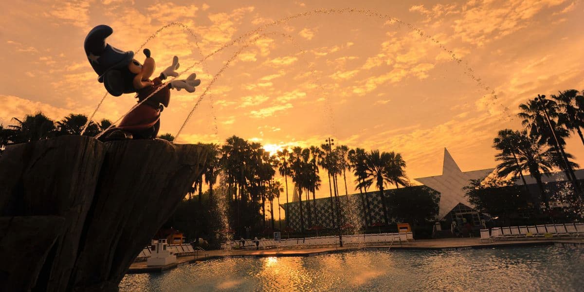 A statue of Mickey Mouse near the Fantasia Kiddie pool at Disney's All-Star Movies Resort.