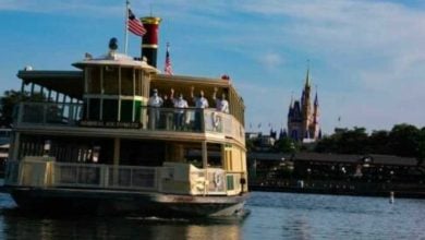The Magic Kingdom ferryboat on Seven Seas Lagoon with Cinderella Castle in the background