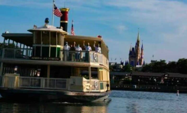 The Magic Kingdom ferryboat on Seven Seas Lagoon with Cinderella Castle in the background