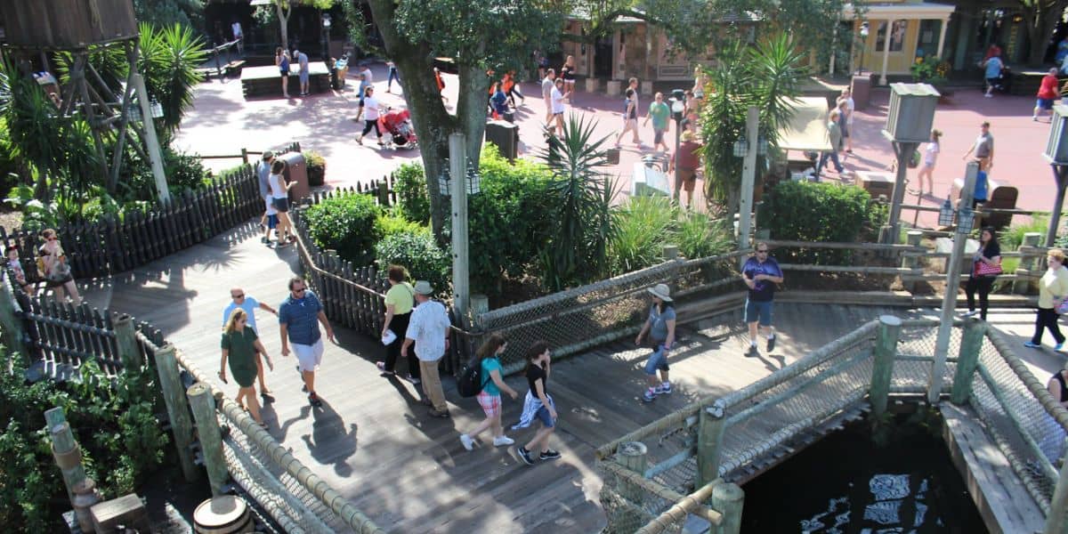 Guests walking along the pier in Frontierland at Magic Kingdom Park.