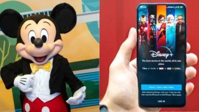 A person in a Mickey Mouse costume poses on the left, while a hand holds a smartphone displaying the Disney+ streaming app with various animated characters on the right.