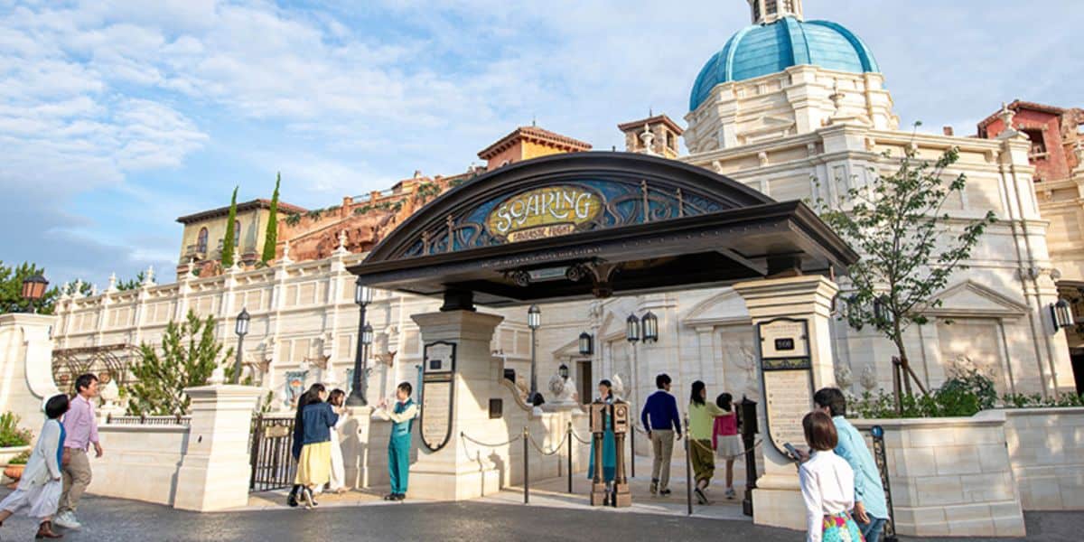 Visitors walk near the entrance of Soaring at Tokyo DisneySea