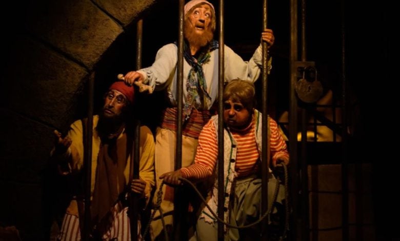 Animatronics in jail on the Pirates of the Caribbean ride at Magic Kingdom Park