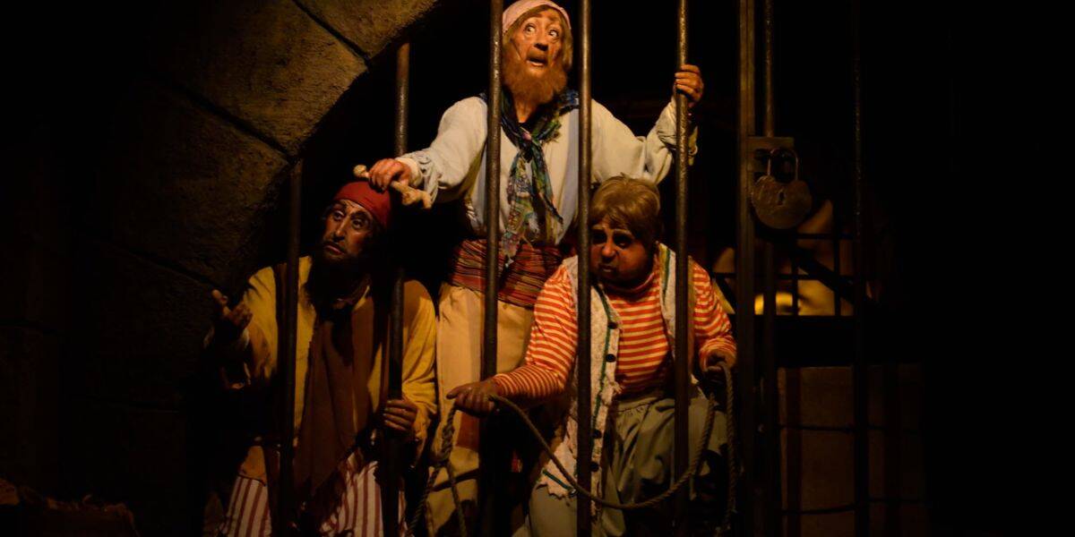 Animatronics in jail on the Pirates of the Caribbean ride at Magic Kingdom Park