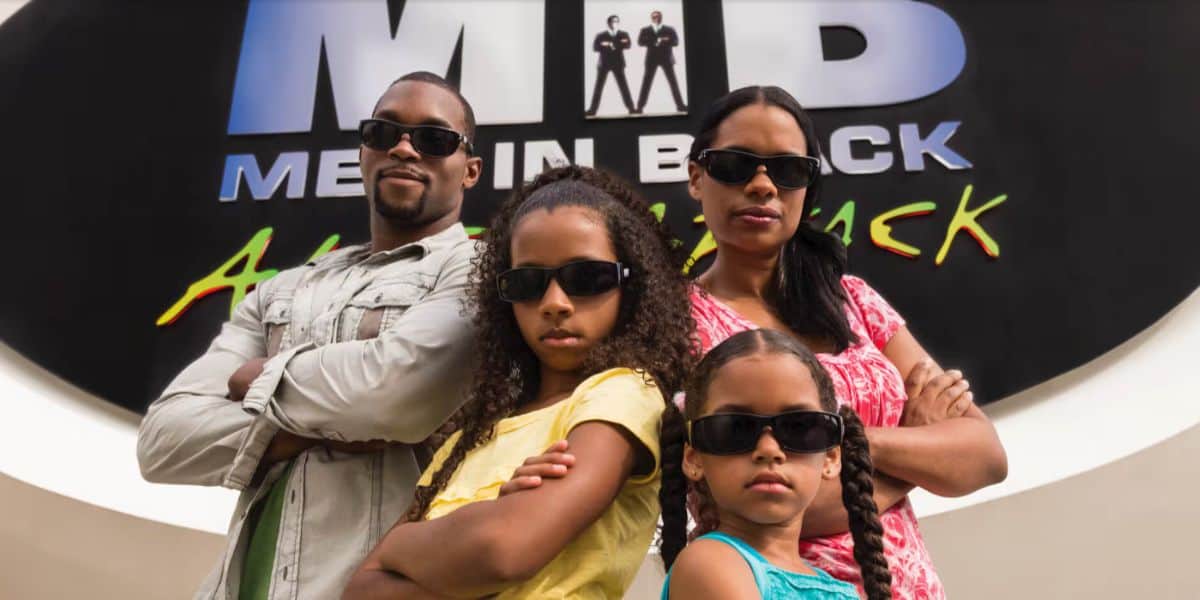 family standing in front of MIB Alien Attack sign in Universal Studios Florida