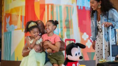smiling family at disney world hotel