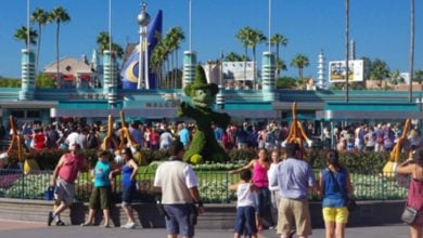 Guests walking into Disney's Hollywood Studios at Disney World. Disney vacation cost