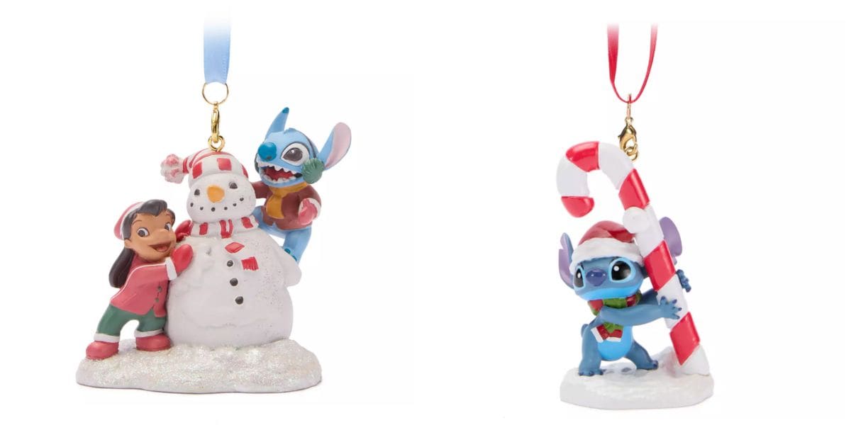 Two Disney Store Christmas ornaments featuring "Lilo & Stitch": one shows Lilo, Stitch, and a snowman; the other has Stitch in a Santa hat with a candy cane. Both festive ornaments hang by ribbons.