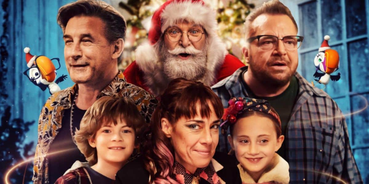 A group of adults and children pose together, with a man dressed as Santa Claus in the center background. Festive lights and cartoonish penguin characters add to the cheerful holiday vibe, reminiscent of a Disney+ winter special.