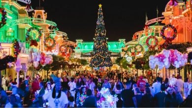 huge crowds flood streets of Main Street during Christmas time in Disney World