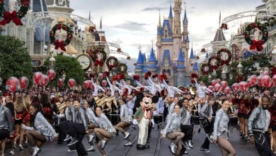 Mickey Mouse leads dancers in The Disney Parks Magical Christmas Day Parade