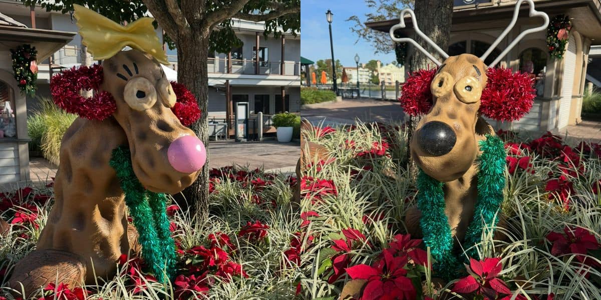 Holiday-adorned dog statues at Disney Springs sport antlers, bows, tinsel, and are framed by festive red poinsettias.