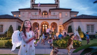Kids playing in front of a Disney Golden Oak home.