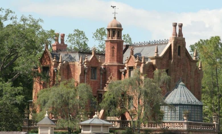 The Haunted Mansion at Magic Kingdom Park on a clear day.