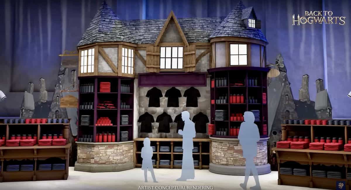 Wizarding World shop display featuring folded robes, themed shirts, and silhouettes of guests browsing for magical gear.