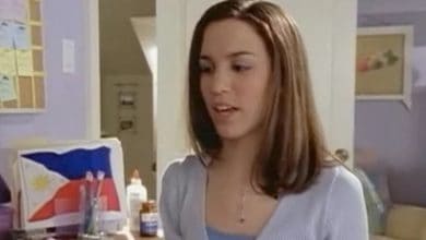 Studious teen girl with Christy Carlson Romano vibes in her bedroom, school supplies out, Philippine flag displayed behind.