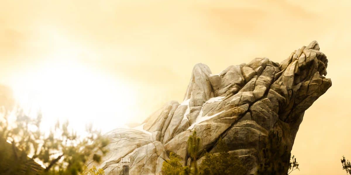 Iconic wolf-shaped rock formation glows at sunset in Disneyland, though some areas remain off-limits due to guest flow.