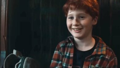 Ron smiling on the Hogwarts Express in HBO's 'Harry Potter'