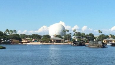 Spaceship Earth towers above the EPCOT World Showcase Lagoon