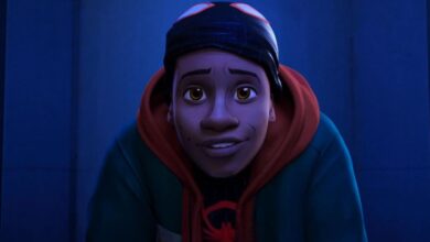 Miles Morales with Spidey mask lifted in 'Into the Spider-Verse'