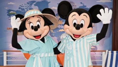 Mickey and Minnie greet guests in their new DVC outifts