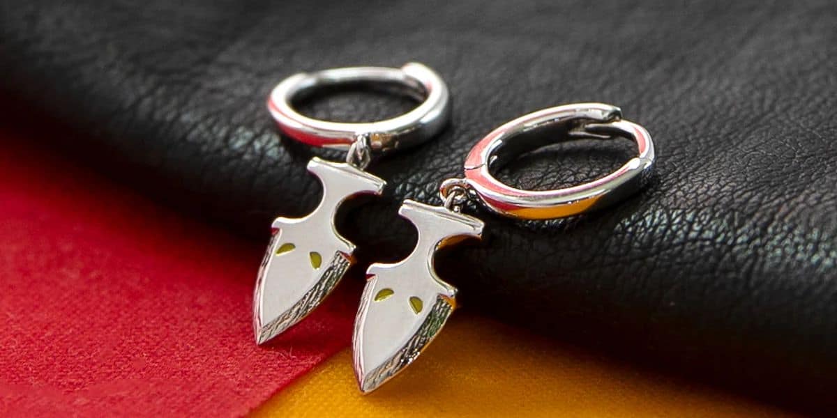 Silver hoop earrings with dagger pendants inspired by 'Deadpool & Wolverine'