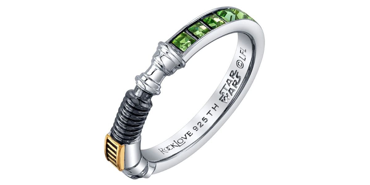 Star Wars lightsaber ring with green stones and engraved text