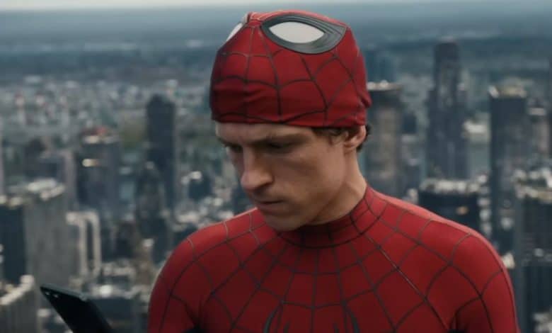 Tom Holland as Spider-Man in 'Spider-Man: Brand New Day,' glaring at phone