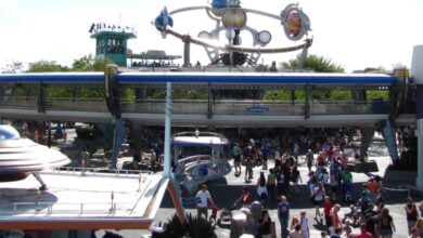 Guests explore Tomorrowland at Magic Kingdom