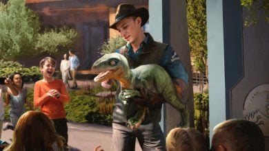 concept art of a Universal employee holds a dinosaur for kids to meet in Jurassic World Adventure Camp area in Universal Kids Resort