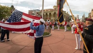 Veterans in flag retreat ceremony at Magic Kingdom.