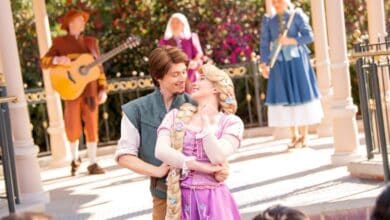 Rapunzel dances with Flynn Rider at Disney Adventure World