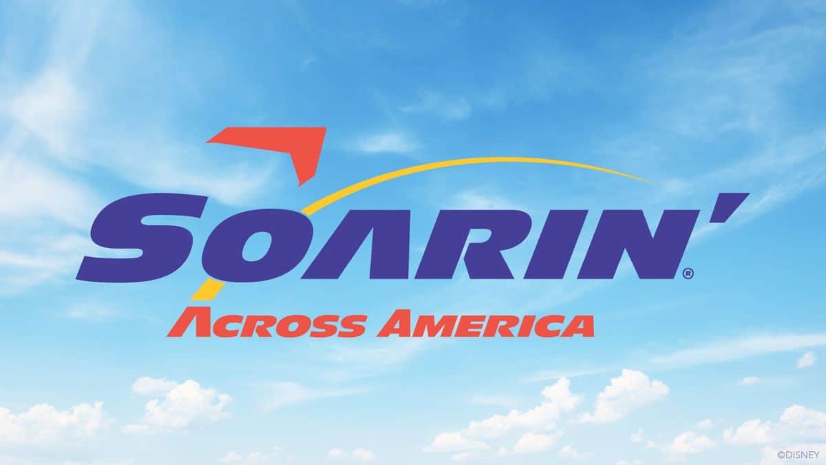 Soarin' Across America" logo set in a bright, cloud-filled sky, marking the 250th and sparking debate among Disney fans.