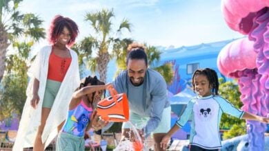 a family plays in finding nemo pool at disney's art of animation resort hotel