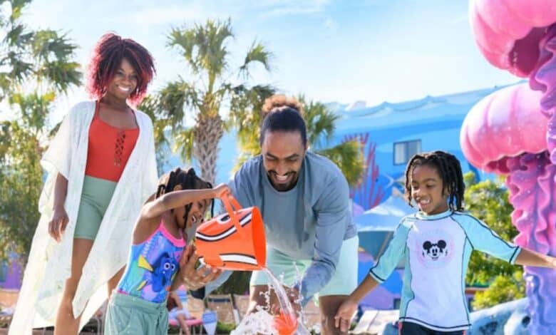 a family plays in finding nemo pool at disney's art of animation resort hotel