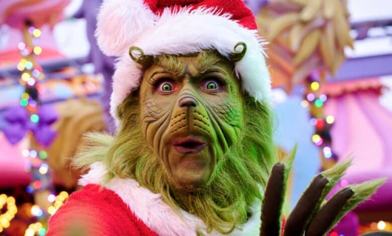 The Grinchmas Christmas tree and holiday decorations at Universal Studios Hollywood's Universal Plaza.