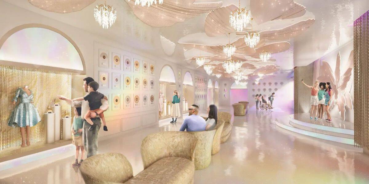Bright, pastel lobby with sparkling chandeliers and comfy seats where visitors enjoy themed displays and character mannequins.