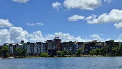 Sleek waterfront towers evoke a Disney-area vibe, offering a magical stay steps from the action and effortless reservation access.