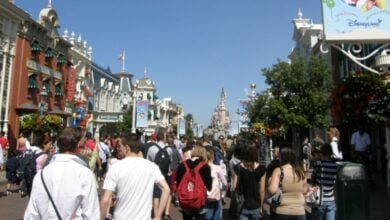 Guests stroll along Main Street USA at Disneyland Paris