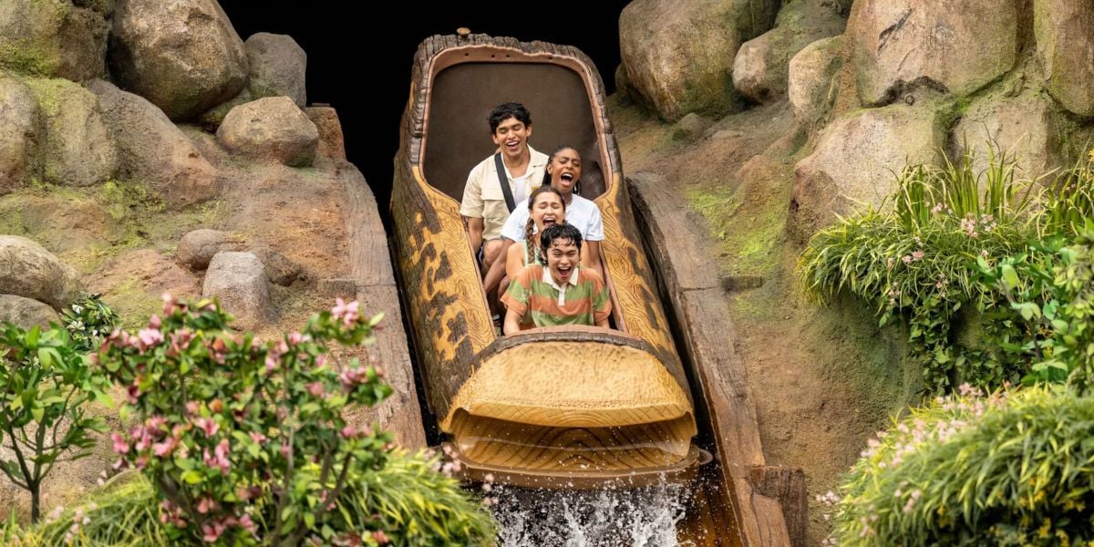 Guests ride Tiana's Bayou Adventure